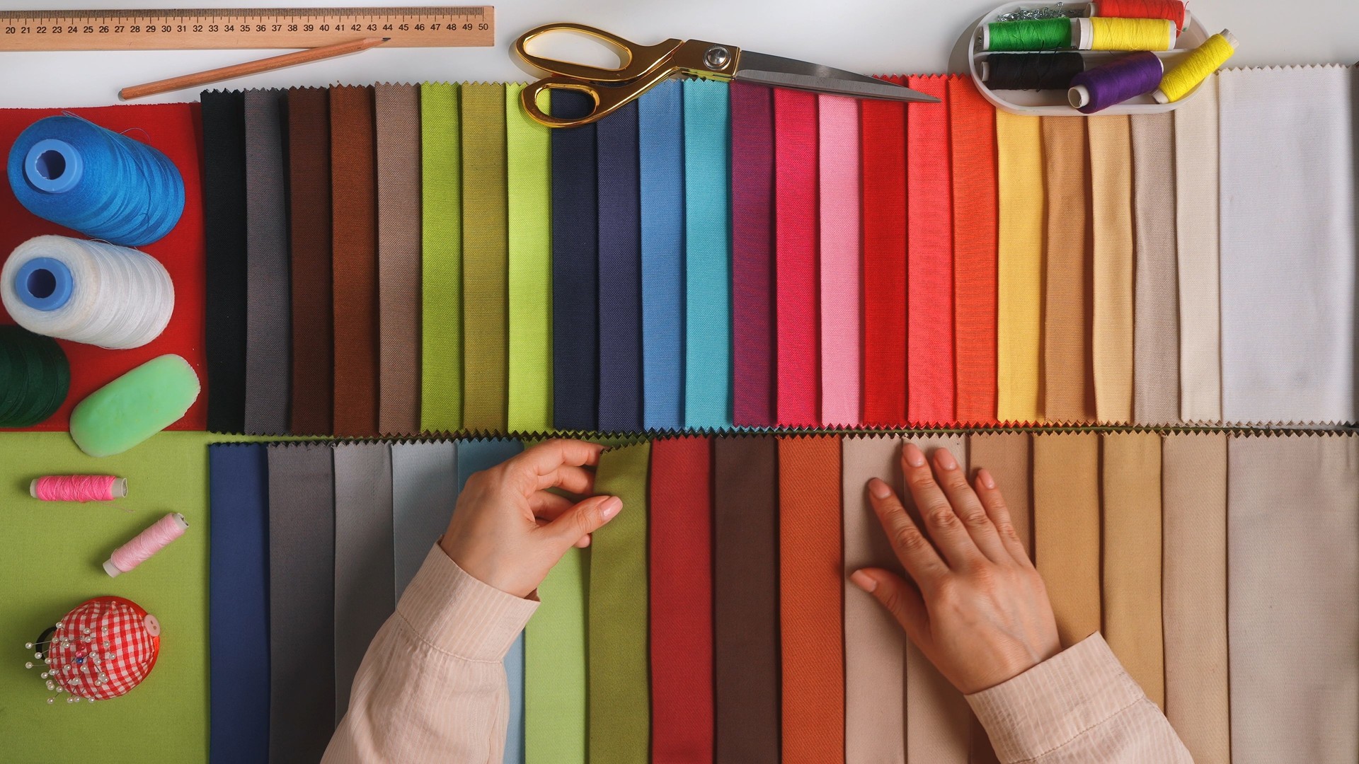 Colorful Textile and Sewing Accessories on Display Surface